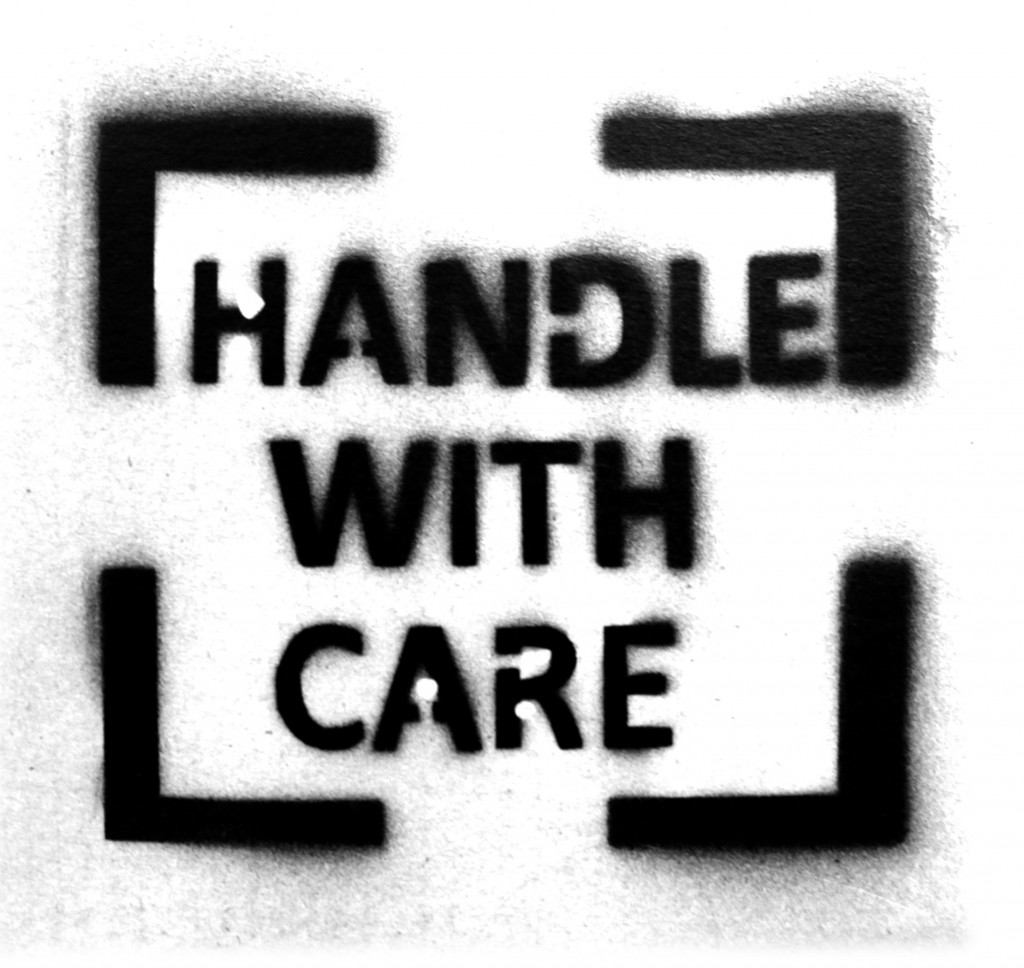 handle-with-care-logo